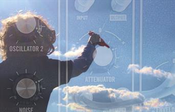 Musician surrounded by blue sky