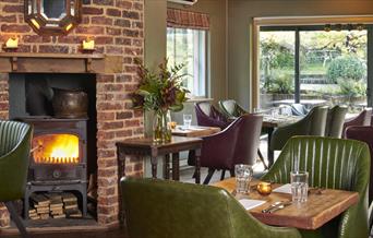 Dining room with wood burner