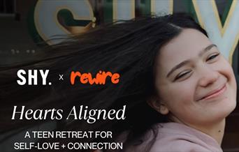 Teenager smiling and tossing her hair