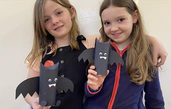 children with handmade bats