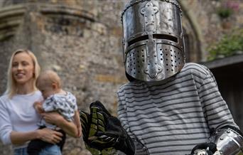Boy dressed up as a knight in armour