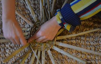 weaving a rush platter