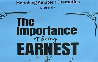 Poster with title of the play