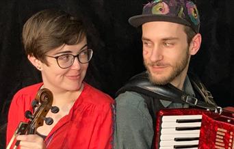 Musicians Tom Evans (accordion, voice, melodeon) & Harriet Barton (fiddle)