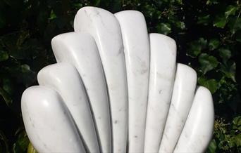 Fan shaped stone sculpture