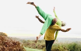 People dancing in the open air on the Downs