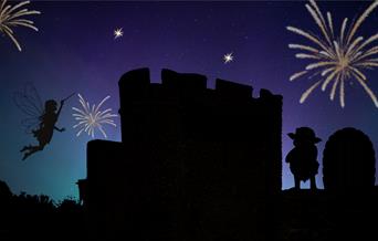Silhouette or castle with fairy and goblin and fireworks