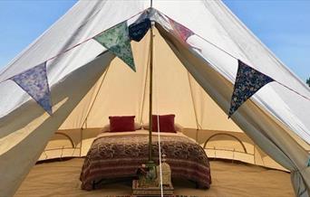 Glamping tent with buting