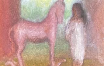 image of a child with a rocking horse