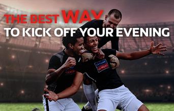 Footballers celebrating a goal