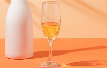 Glass of orange wine