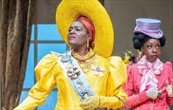 Characters on stage in The Importance of Being Earnest.