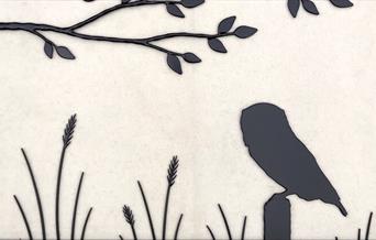 Metalwork bird and tree