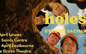 5 characters staring down a hole - photographed from the bottom of the hole!