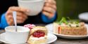 Scone served with jam and cream