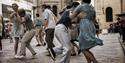 People jiving in the street