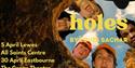 5 characters staring down a hole - photographed from the bottom of the hole!