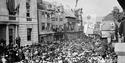 Black & white view of a crowded Lewes High Street