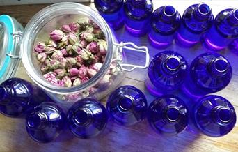 Rose buds and bottles