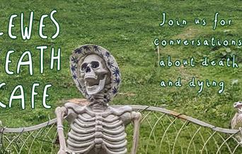 Skeleton sitting on a garden bench