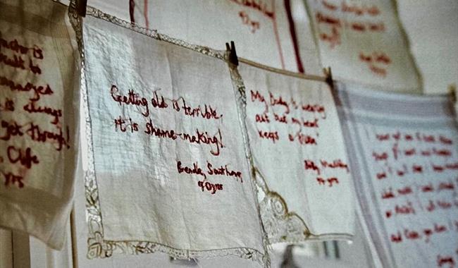 Embroidered handkerchiefs with messages from the elderly