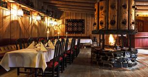 Table decorated for party in the dining room at Fossekroa Restaurant