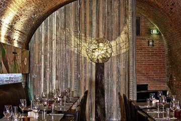 Tables ready for guests at Bryggerikjelleren