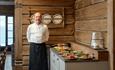 The chef shows off food for catering