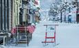 Kicksledge in the walking street in Lillehammer