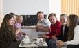 Kids enjoying hot chocolate and desserts at Stasjonen Cafe & Restaurant