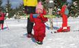 A child trying skiing at the first time