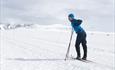 A woman crosscountryskiing in Rondane