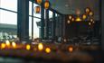 Cozy restaurant with views and ambient lighting.