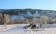 Rybakken Camping med Hafjell i bakgrunnen