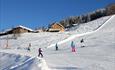 People skiing in Hafjell Alpine Center