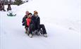 Tobogganing in Skåbu