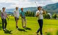 Group of golfers on the course.