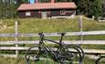 Bike leaned against the fence at Nystera