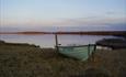 Smal boat by a mountain lake