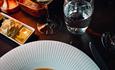 Plate with an elegantly presented dish.