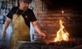 Blacksmith at the Norwegian Road Museum