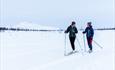 Two women enjoying classic cross country skiing, Venabygdsfjellet