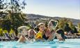 Family enjoying the swimming pool at Hunderfossen