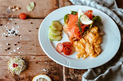 Smoked salmon open sandwich with egg and salad garnish | Venabu Fjellhotell