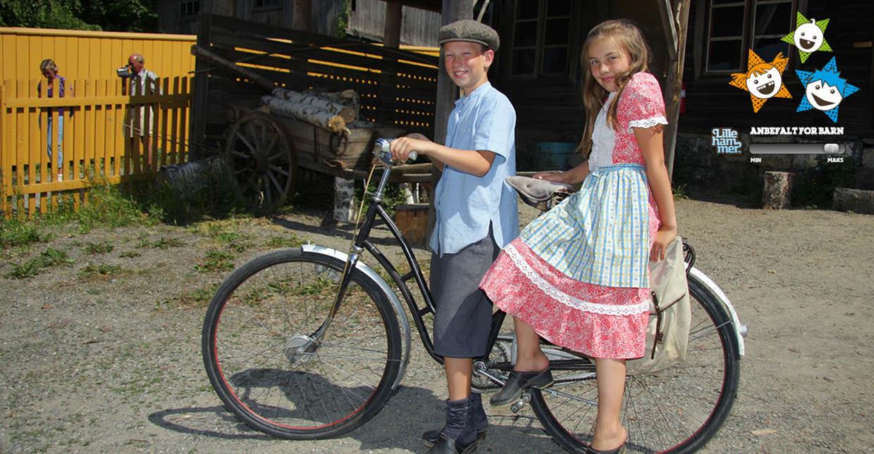 Children on bike at outdoor museum Maihaugen