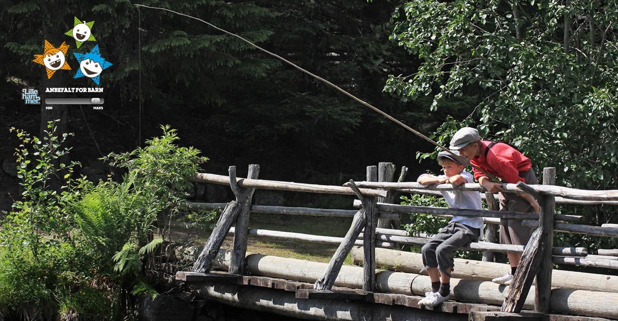 Children fishing with ancient equipment