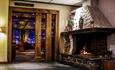 The fire place in the reception - Hunderfossen Hotel & Resort