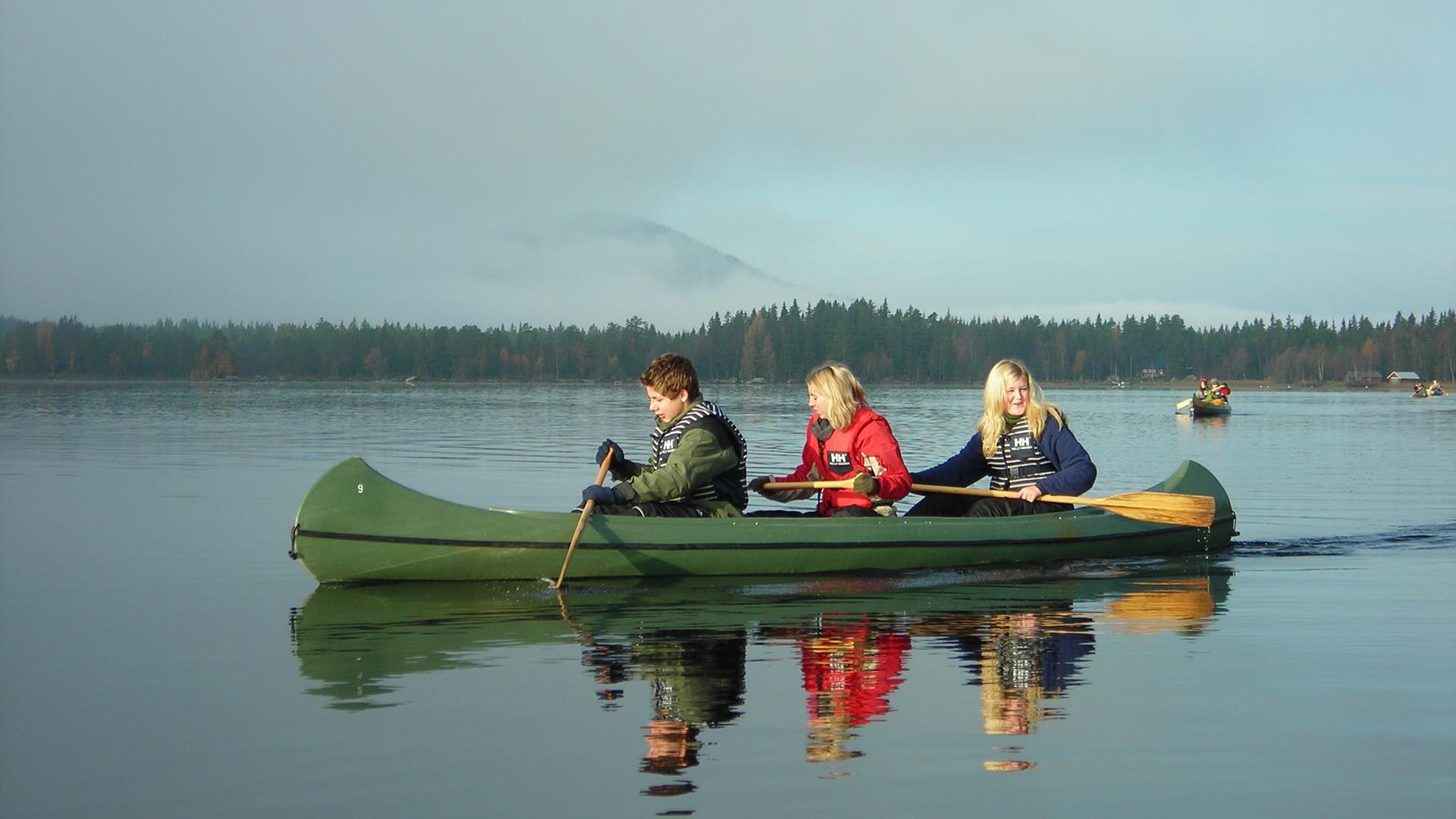 Canoeing with three people