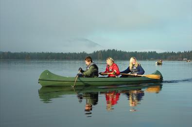 Canoeing with three people