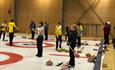 Several teams playing curling